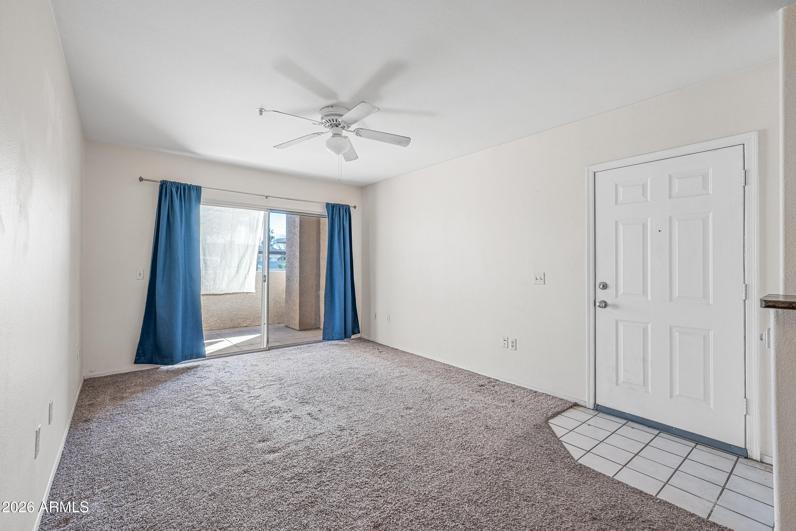 1295 North Ash Street, Unit 617 Gilbert, AZ 85233 - Photo 6 of 21 a view of an empty room with a window