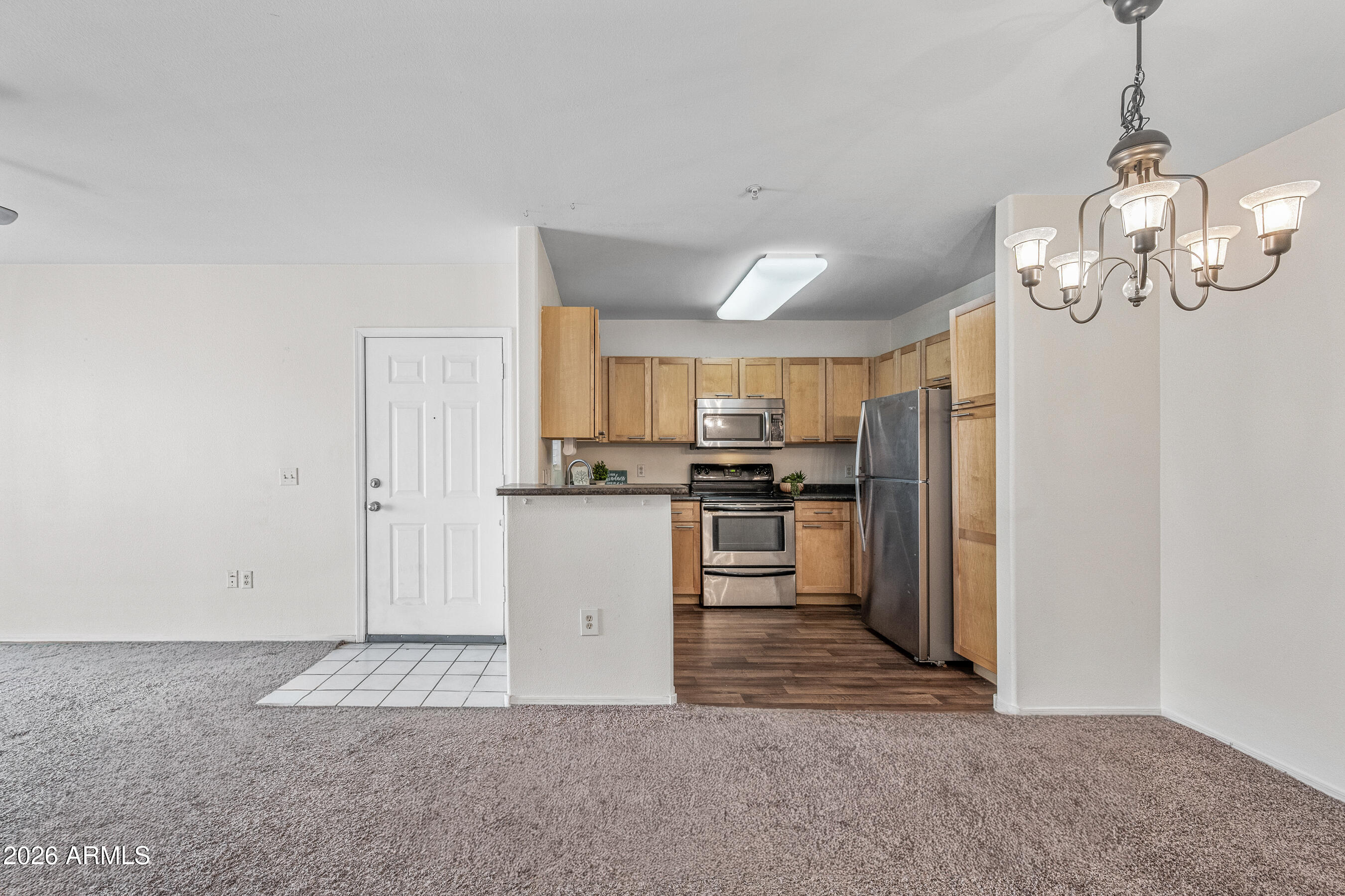 1295 North Ash Street, Unit 617 Gilbert, AZ 85233 - Photo 8 of 21 a view of a kitchen with electric appliances