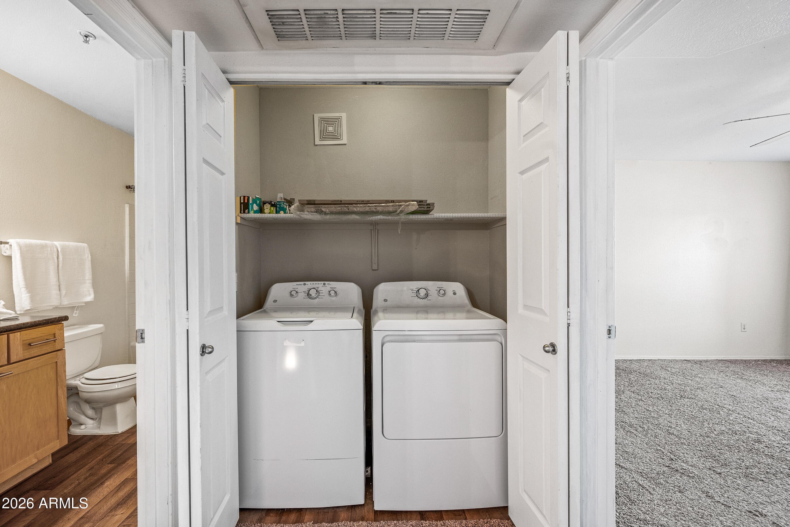 1295 North Ash Street, Unit 617 Gilbert, AZ 85233 - Photo 10 of 21 a utility room with dryer and washer