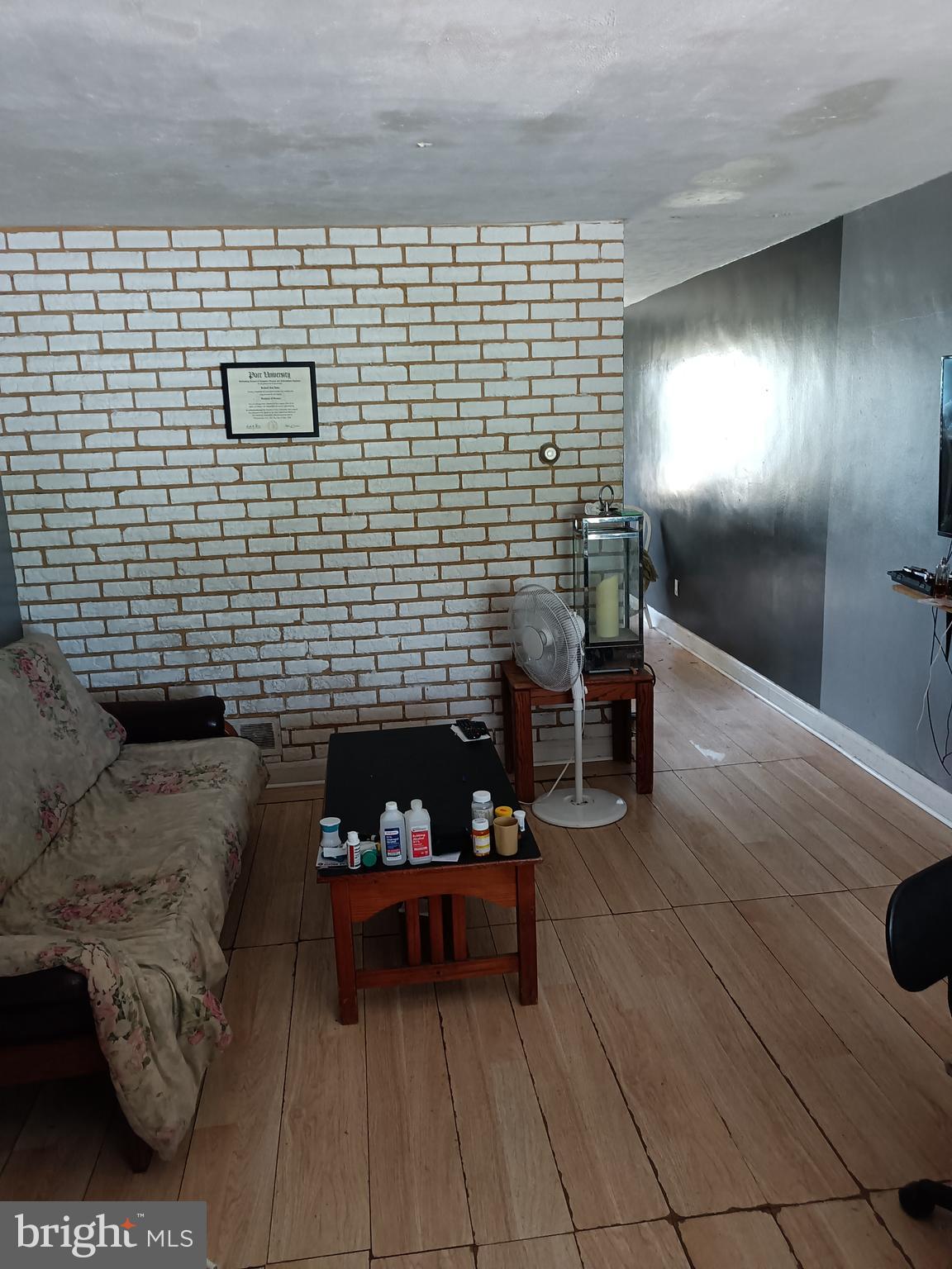 5013 Schaub Avenue Baltimore, MD 21206 - Photo 5 of 7 a living room with furniture