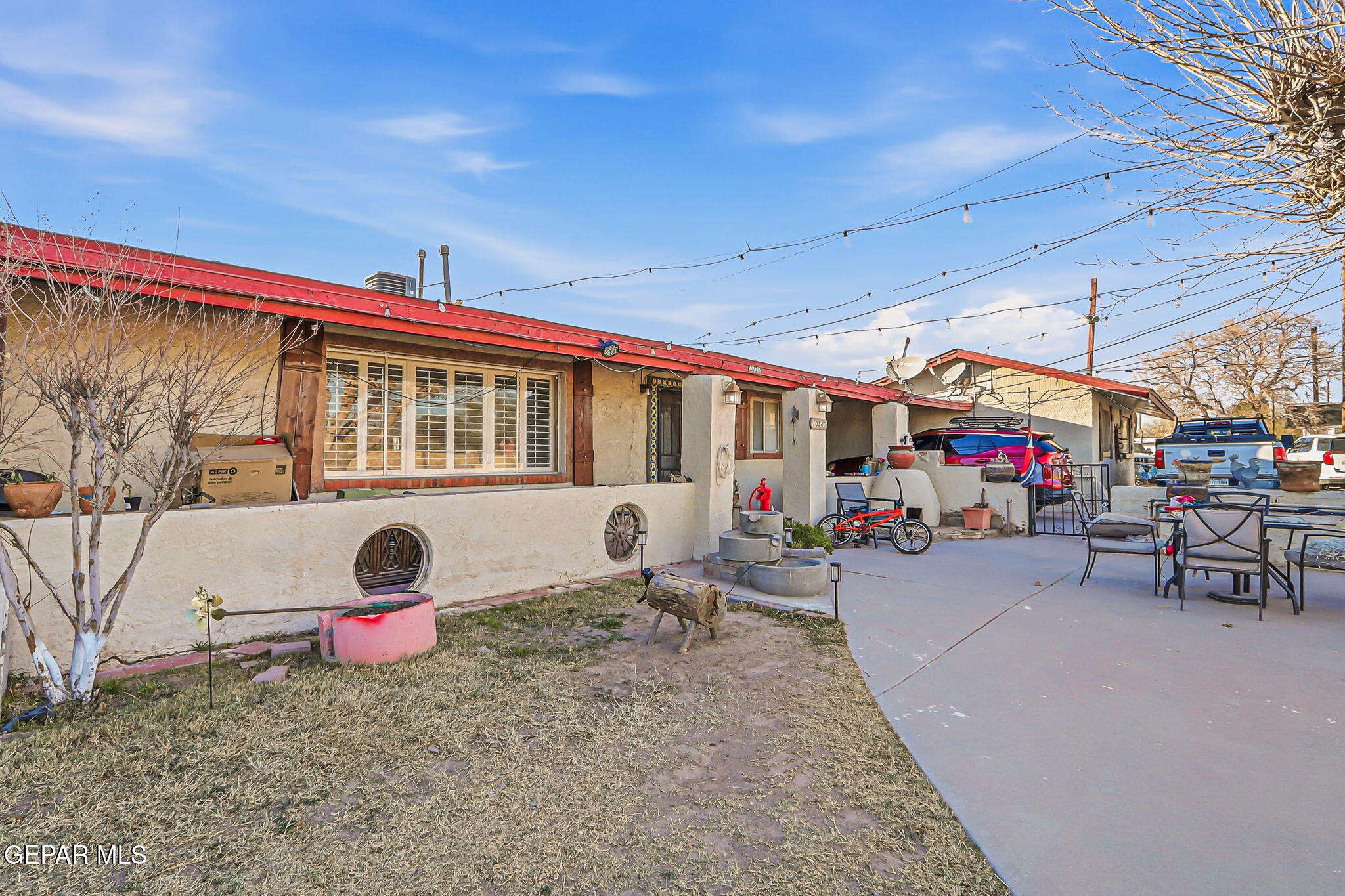 10540 Socorro Road Socorro, TX 79927 - Photo 15 of 45 a view of a patio with a table and chairs and potted plants