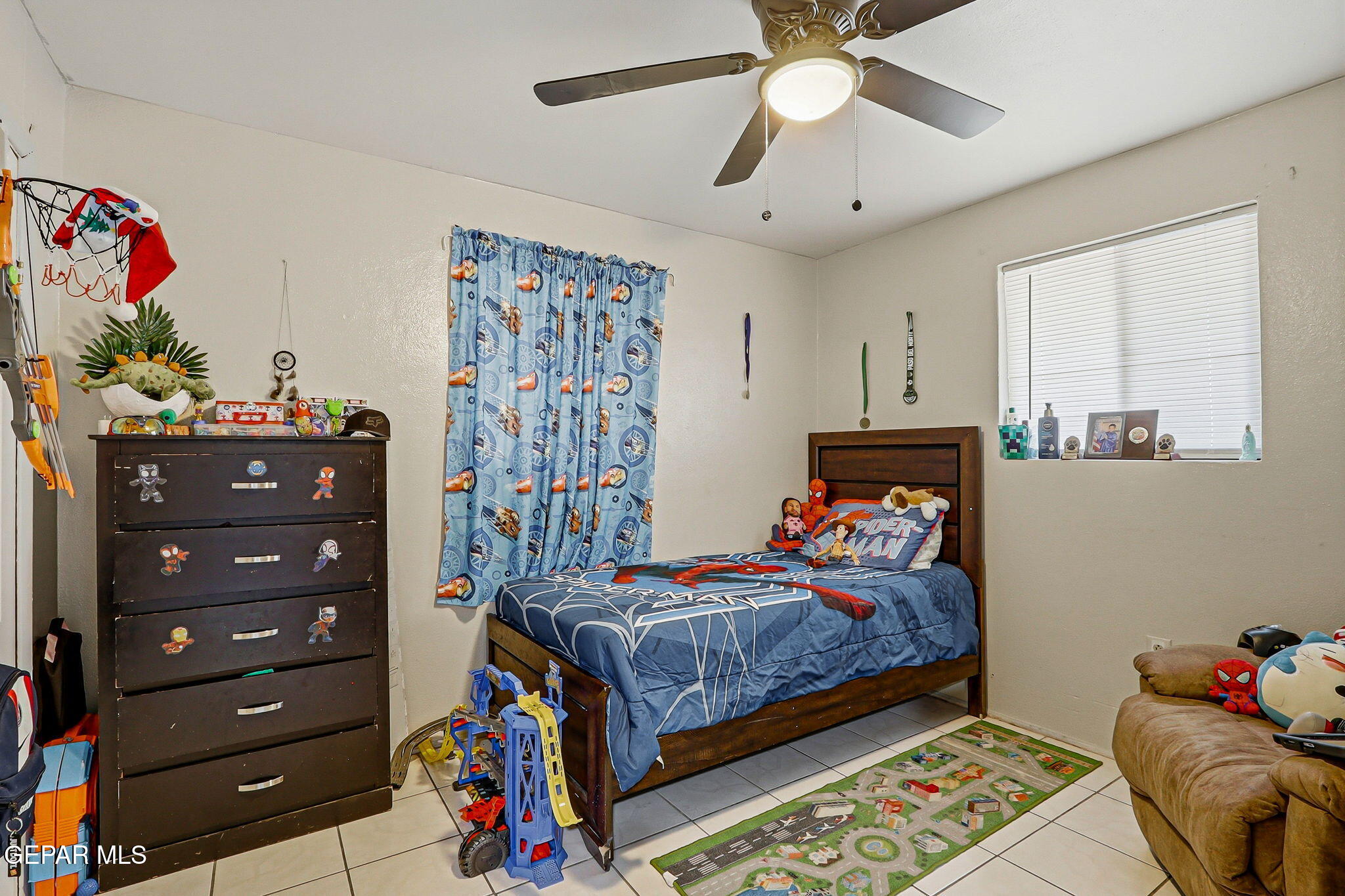 10540 Socorro Road Socorro, TX 79927 - Photo 23 of 45 a bedroom with a bed and furniture