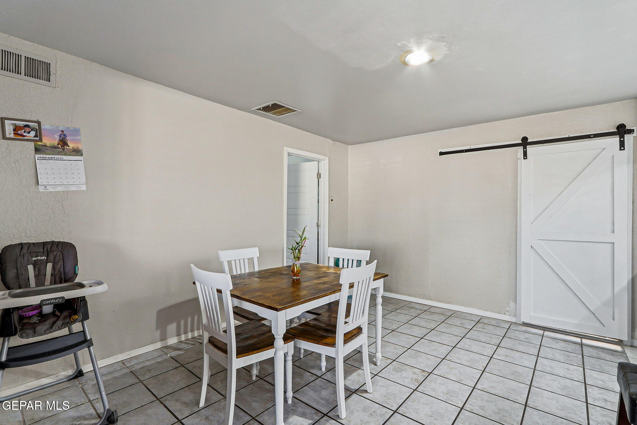 10540 Socorro Road Socorro, TX 79927 - Photo 25 of 45 a workspace with furniture and cabinets