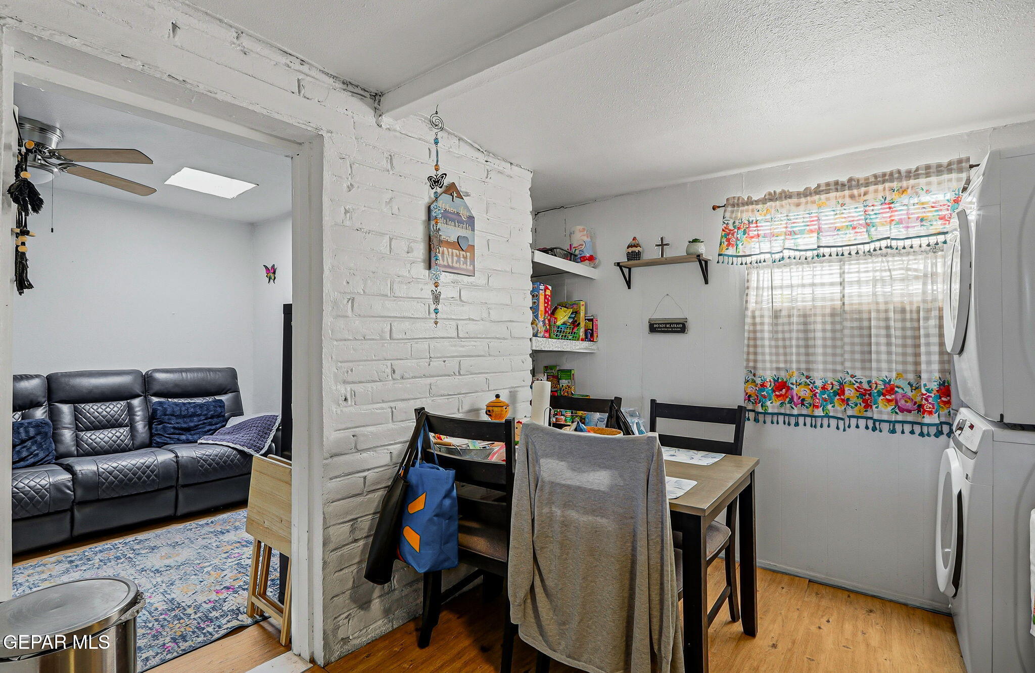 10540 Socorro Road Socorro, TX 79927 - Photo 28 of 45 a view of a workspace with furniture and a livingroom