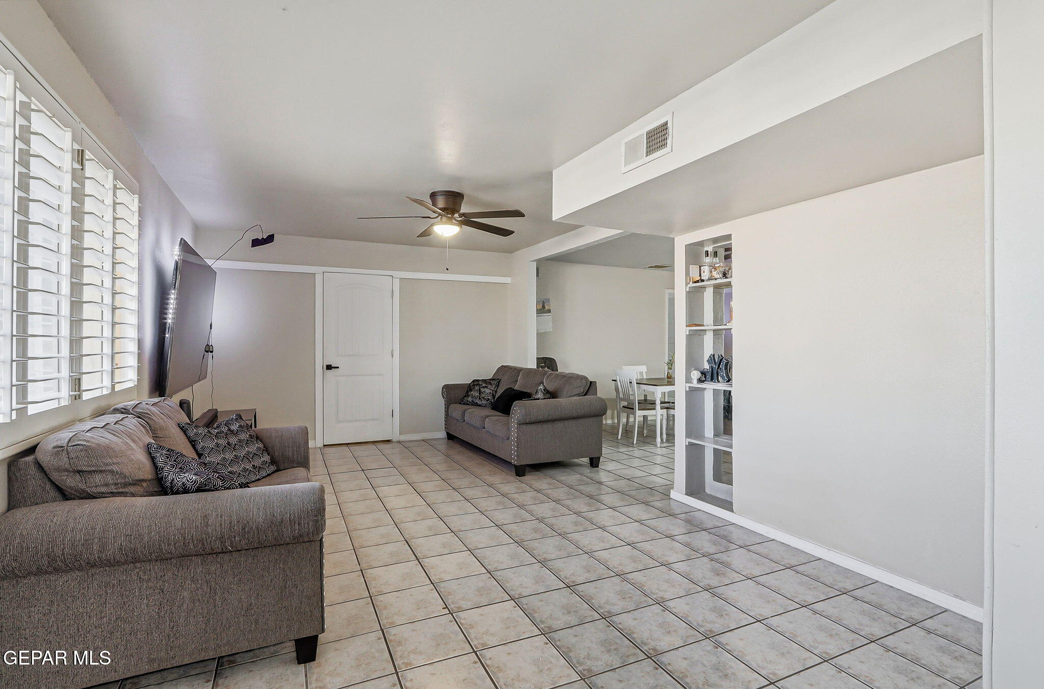10540 Socorro Road Socorro, TX 79927 - Photo 8 of 45 a living room with furniture and a couch