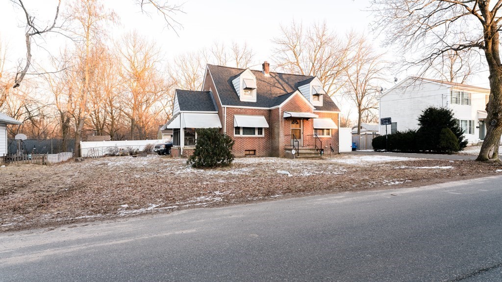 181 Laurelton Street Springfield, MA 01109 - Photo 3 of 17 a front view of house with a yard