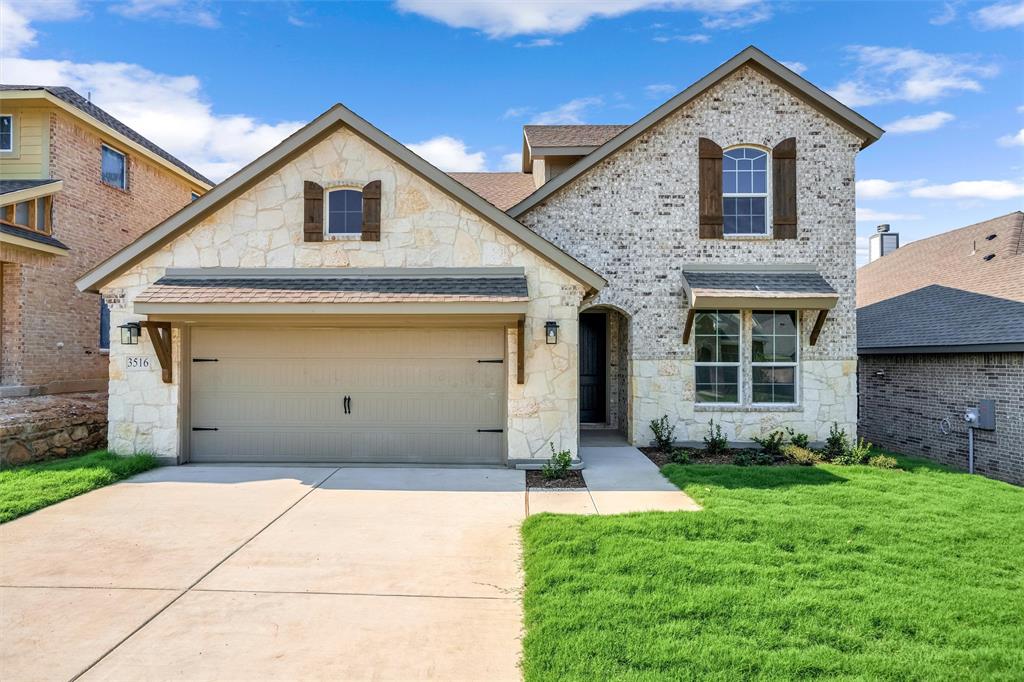 3516 Columbus Street Gainesville, TX 76240 - Photo 2 of 40 a front view of a house with a yard