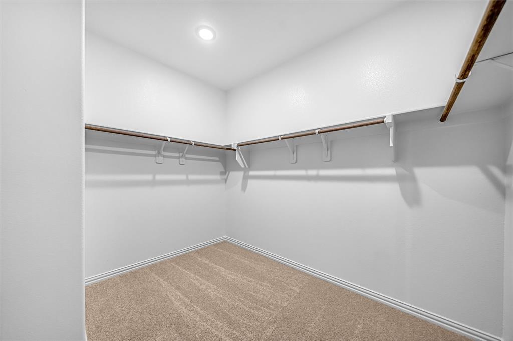 3516 Columbus Street Gainesville, TX 76240 - Photo 21 of 40 a view of a room with shelf on the wall