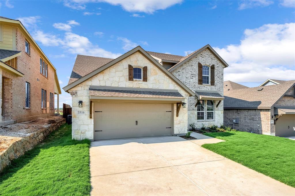 3516 Columbus Street Gainesville, TX 76240 - Photo 3 of 40 a view of a white house with a small yard and large tree