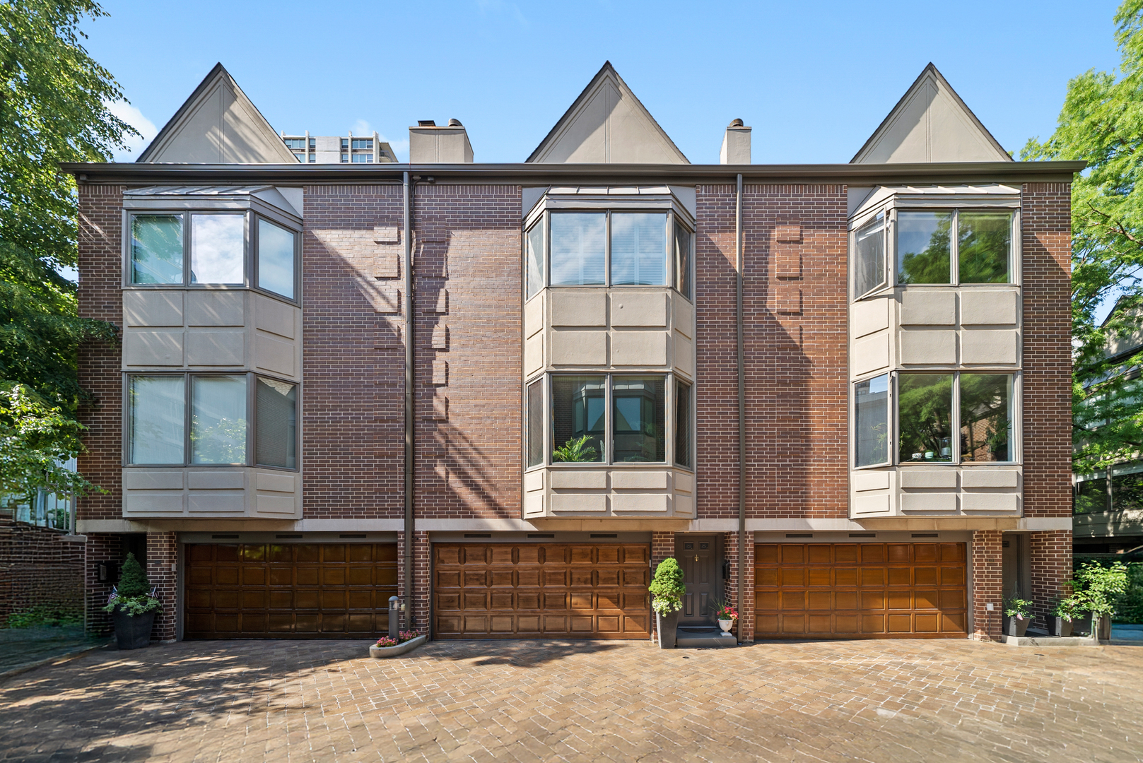 55 West Goethe Street, Unit 1222 Chicago, IL 60610 - Photo 1 of 43 a front view of a house with a yard