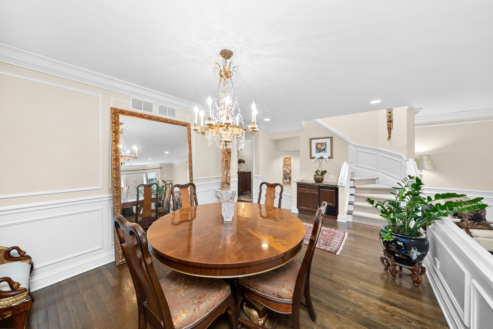 55 West Goethe Street, Unit 1222 Chicago, IL 60610 - Photo 11 of 43 a view of a dining room with furniture and wooden floor