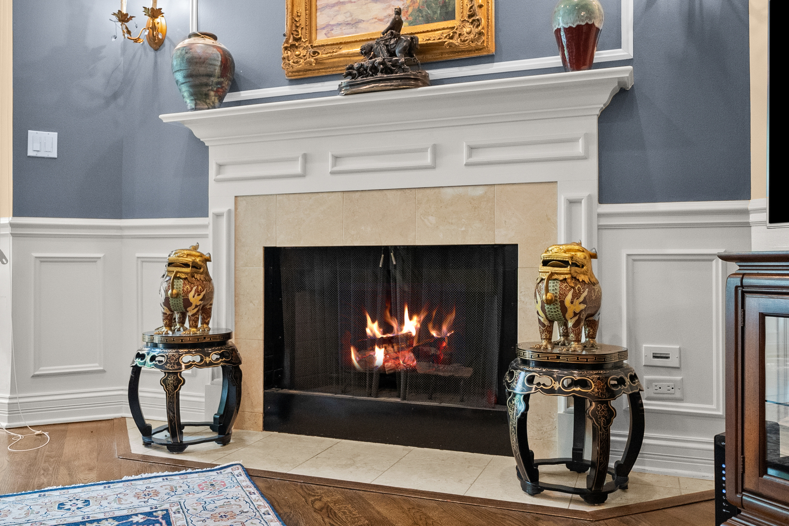 55 West Goethe Street, Unit 1222 Chicago, IL 60610 - Photo 16 of 43 a living room with furniture a fireplace and wooden floor