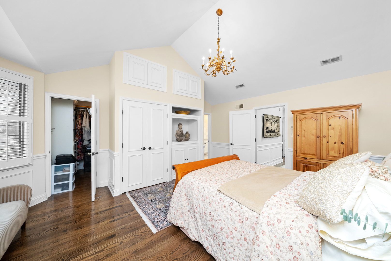 55 West Goethe Street, Unit 1222 Chicago, IL 60610 - Photo 21 of 43 a spacious bedroom with a bed and wooden floor