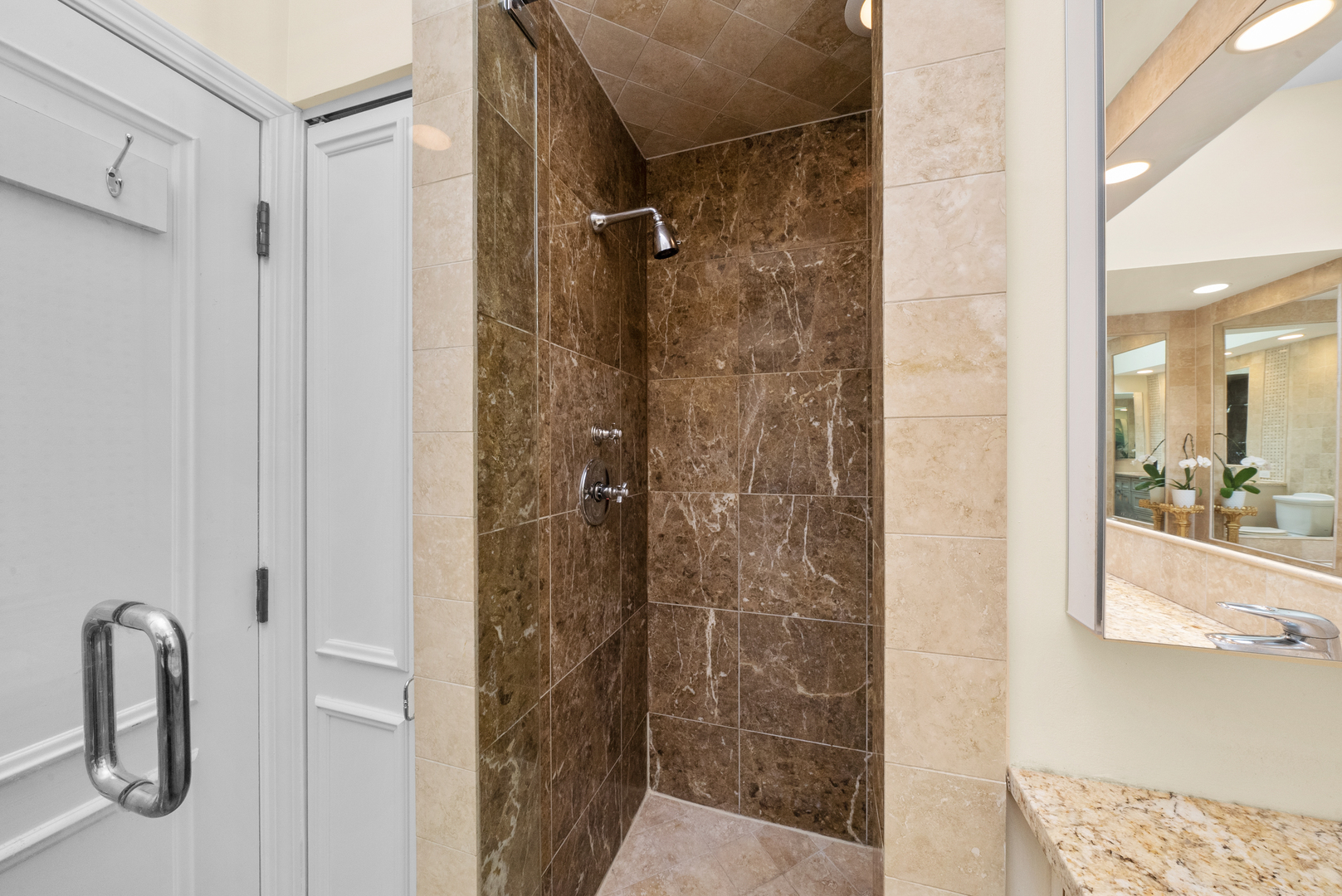 55 West Goethe Street, Unit 1222 Chicago, IL 60610 - Photo 23 of 43 a bathroom with a shower and a sink