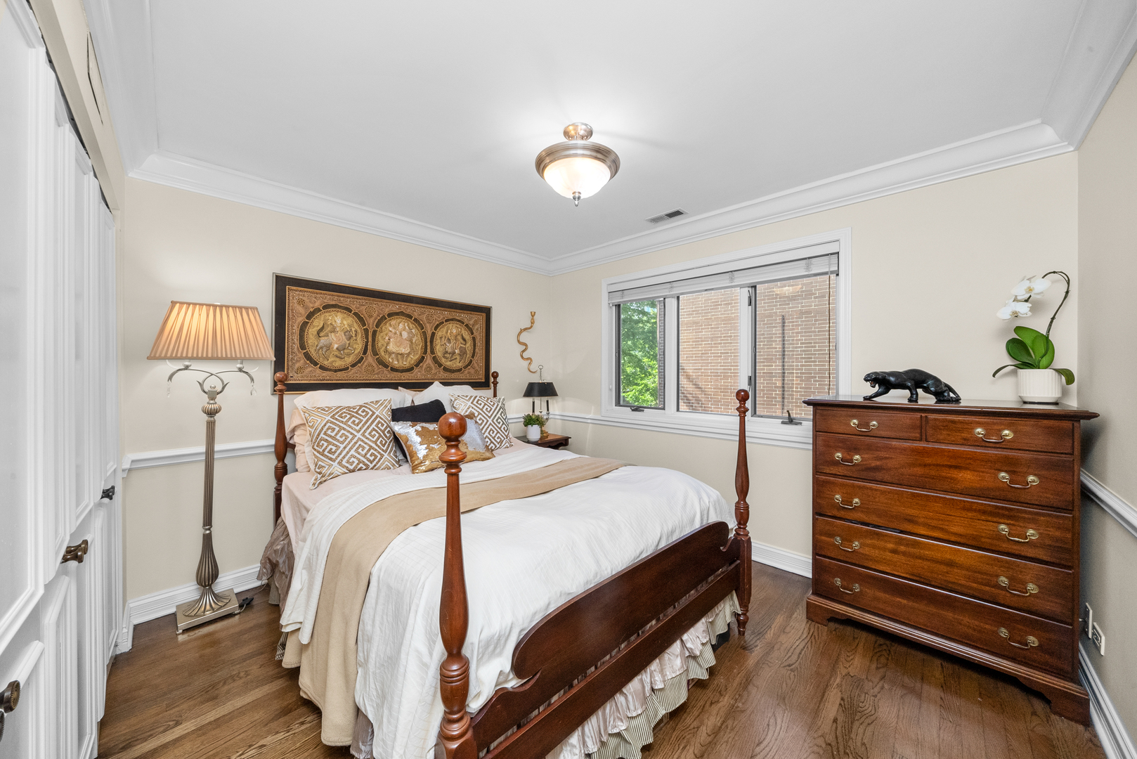 55 West Goethe Street, Unit 1222 Chicago, IL 60610 - Photo 24 of 43 a bedroom with a bed and a dresser