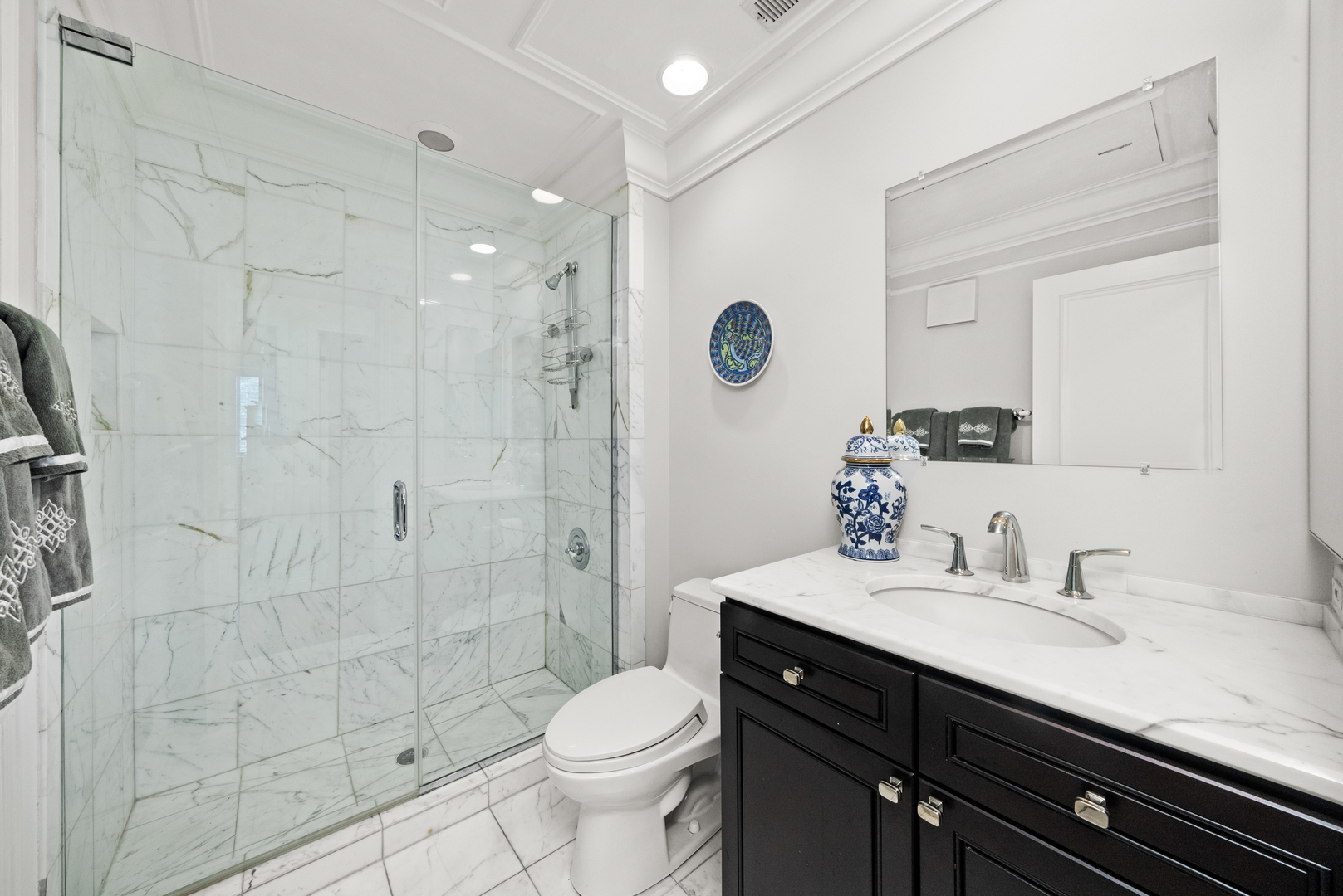 55 West Goethe Street, Unit 1222 Chicago, IL 60610 - Photo 25 of 43 a bathroom with a sink a toilet and shower
