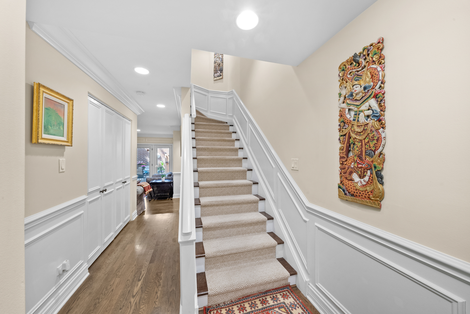 55 West Goethe Street, Unit 1222 Chicago, IL 60610 - Photo 27 of 43 a view of entryway with stairs and wooden floor