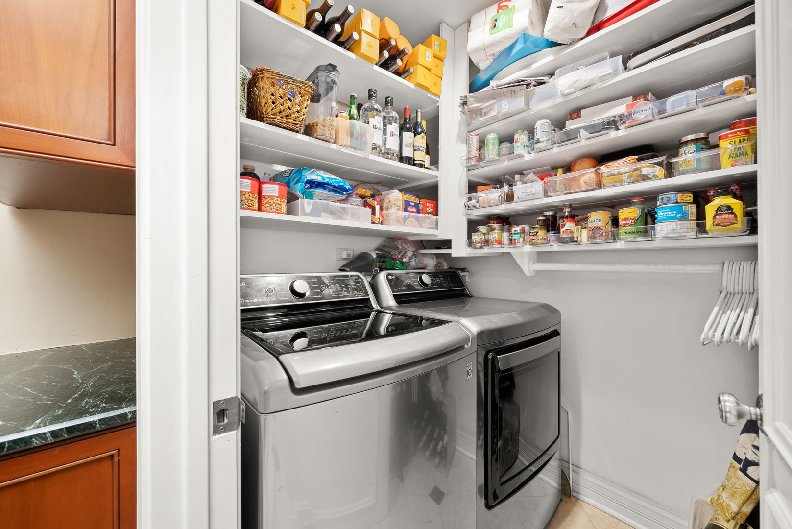 55 West Goethe Street, Unit 1222 Chicago, IL 60610 - Photo 33 of 43 a kitchen with stainless steel appliances granite countertop a stove and a refrigerator