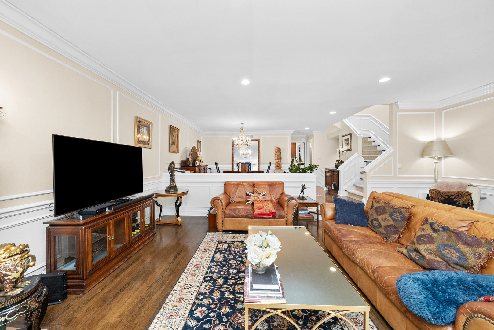 55 West Goethe Street, Unit 1222 Chicago, IL 60610 - Photo 8 of 43 a living room with furniture and a flat screen tv