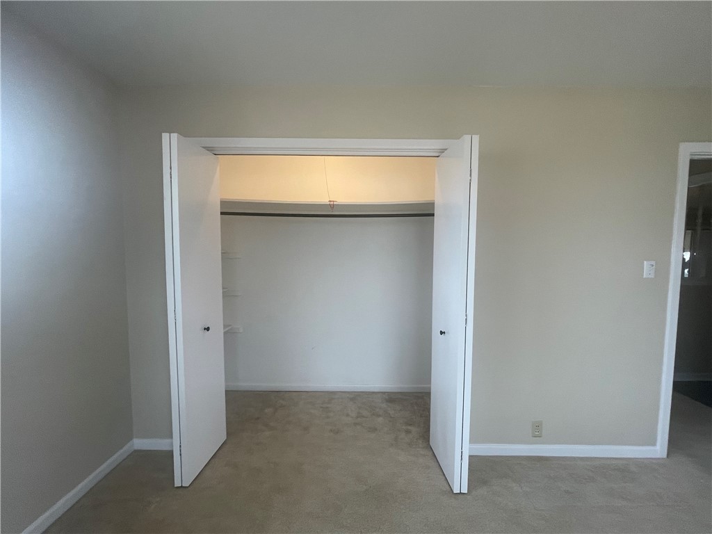 1008 North Bosque Street Meridian, TX 76665 - Photo 17 of 36 an empty room with an entryway