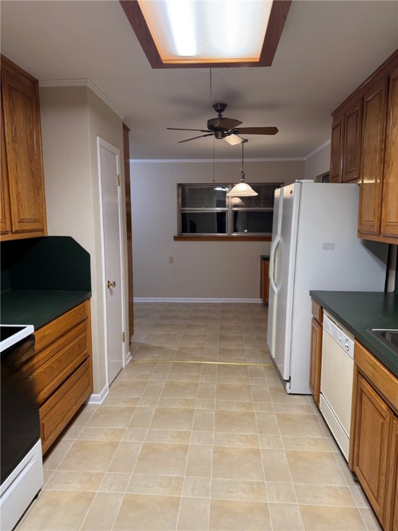 1008 North Bosque Street Meridian, TX 76665 - Photo 27 of 36 a kitchen with granite countertop a refrigerator and a stove