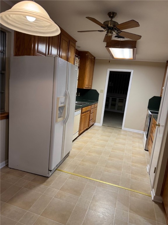 1008 North Bosque Street Meridian, TX 76665 - Photo 30 of 36 a kitchen with stainless steel appliances a refrigerator and a stove