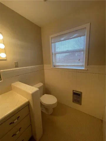 a view of empty room with fan