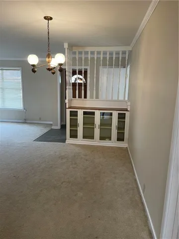 a view of a chandelier in a room
