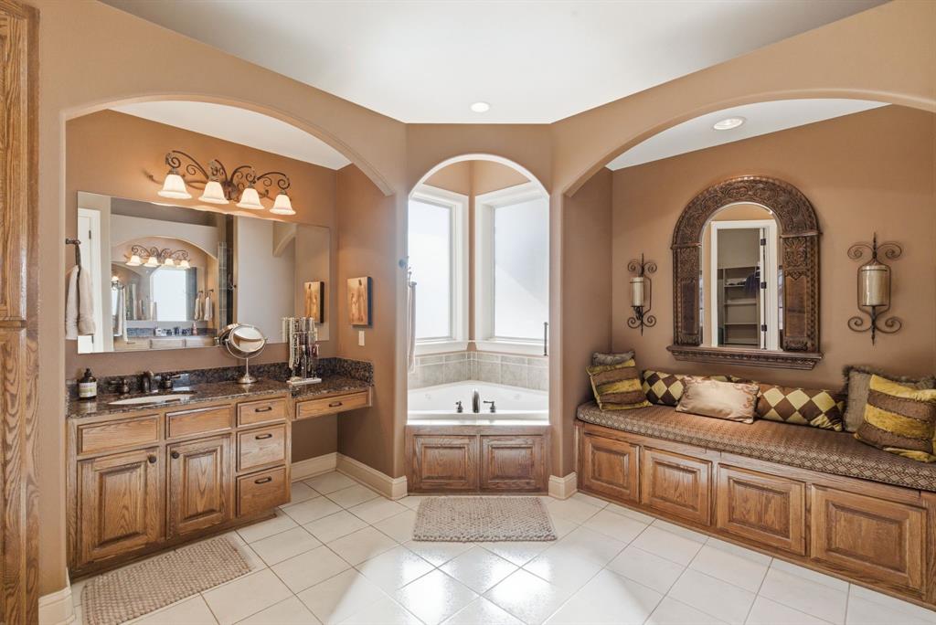 3601 Springfield Road Springtown, TX 76082 - Photo 12 of 40 a large white kitchen with a large window
