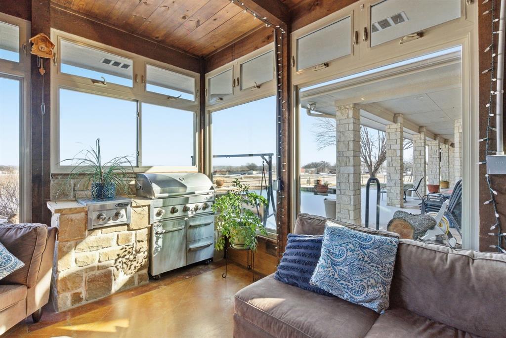 3601 Springfield Road Springtown, TX 76082 - Photo 17 of 40 a living room with furniture and a large window
