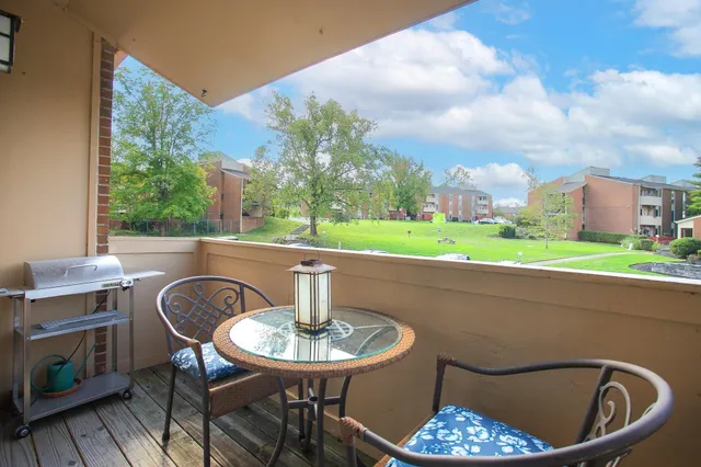 a view of a table and chairs in the patio