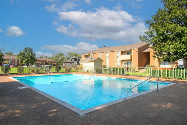 a view of an swimming pool and a yard