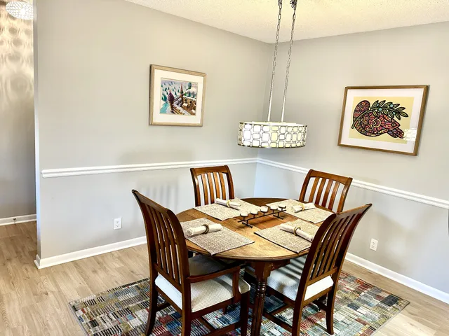 a view of a dining room with furniture