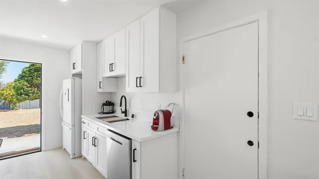 an aerial view of a house with yard swimming pool and outdoor seating