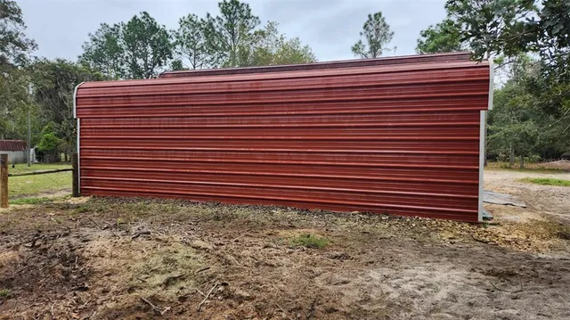 a view of a back yard of the house