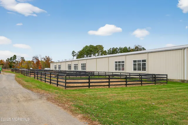 a view of a bench in front of a house
