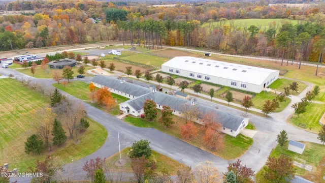 a view of a swimming pool with a yard