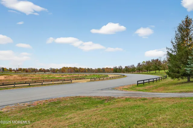 a view of a swimming pool with a lake