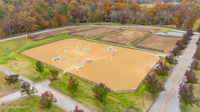 a view of a swimming pool with a yard