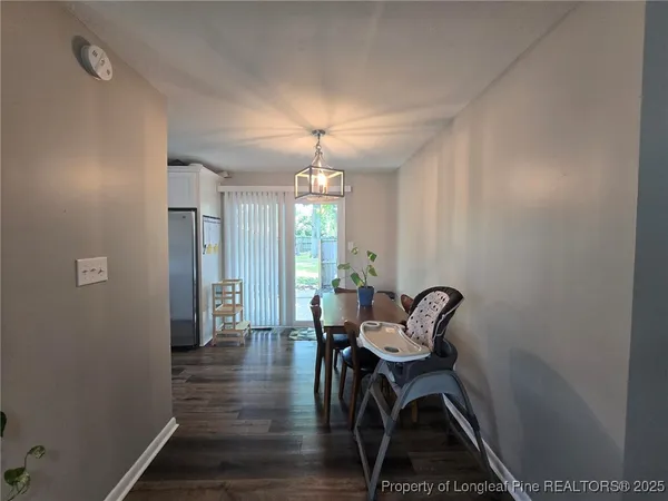 a view of a room with furniture window and wooden floor