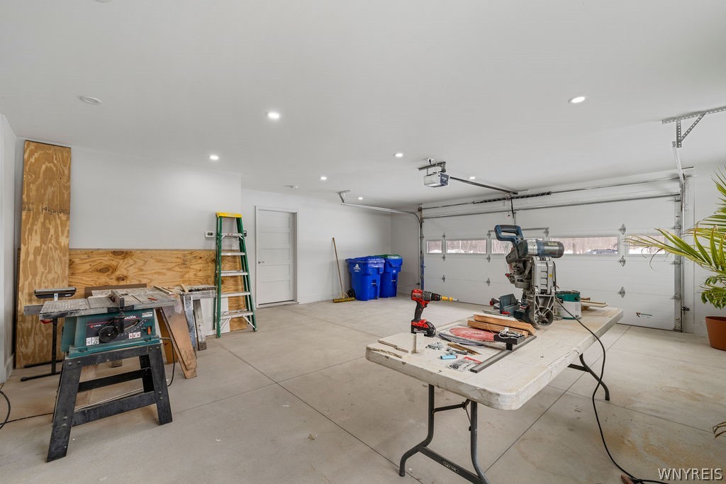 855 Madison Avenue Lewiston, NY 14092 - Photo 18 of 25 Garage with heated floors and tons of storage spac