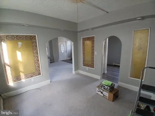 a view of livingroom with furniture and a window