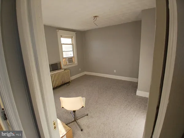 a view of a room with windows