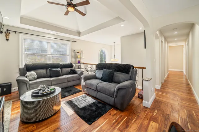 a living room with furniture and a rug