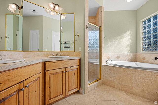 20 Valley Road Leeds, UT 84746 - Photo 21 of 57 Bathroom featuring a dual vanity with light wood cabinetry and light-toned countertops
