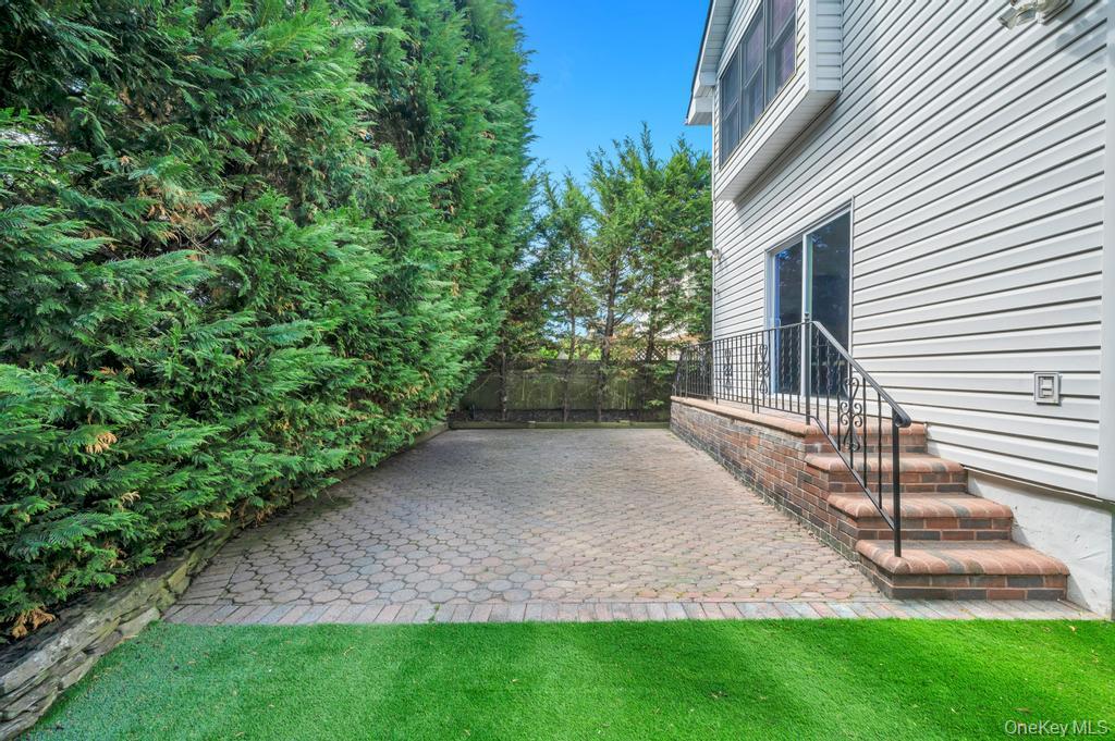 357 Wynsum Avenue Merrick, NY 11566 - Photo 40 of 40 a view of a back yard with a house