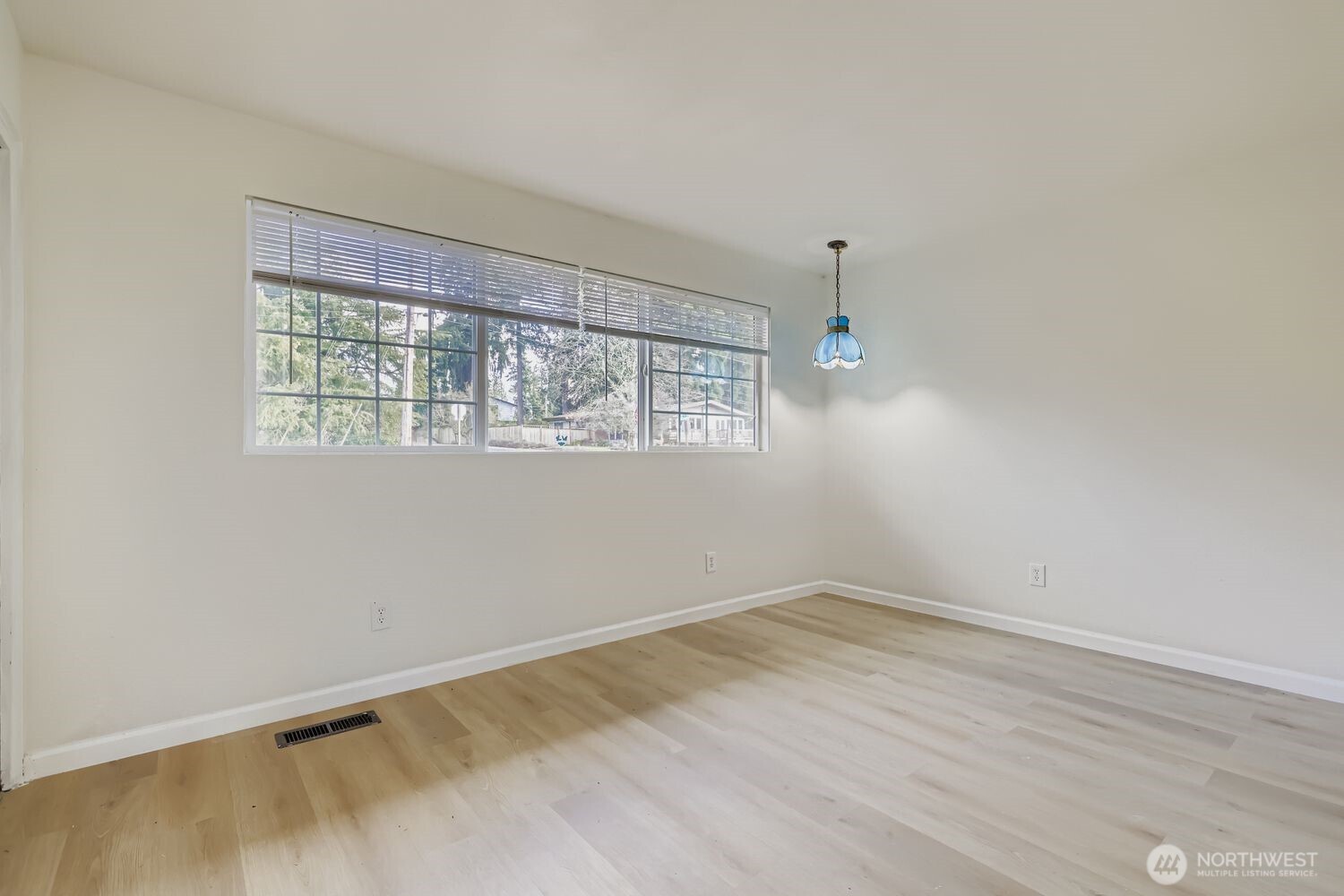 17926 73rd Avenue West Edmonds, WA 98026 - Photo 20 of 40 wooden floor in an empty room with a window