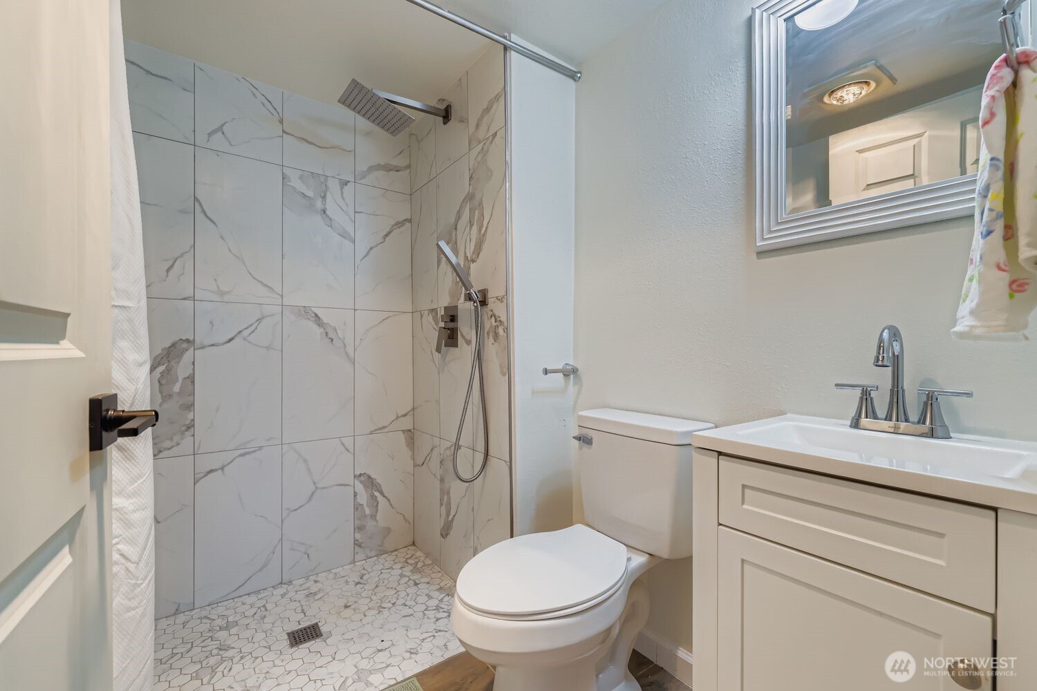 17926 73rd Avenue West Edmonds, WA 98026 - Photo 31 of 40 a bathroom with a sink toilet and shower