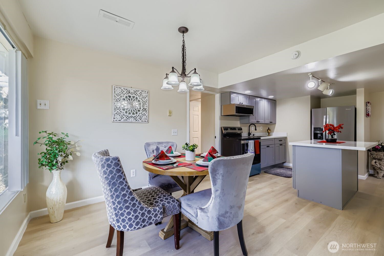17926 73rd Avenue West Edmonds, WA 98026 - Photo 34 of 40 a view of a dining room with furniture window and wooden floor