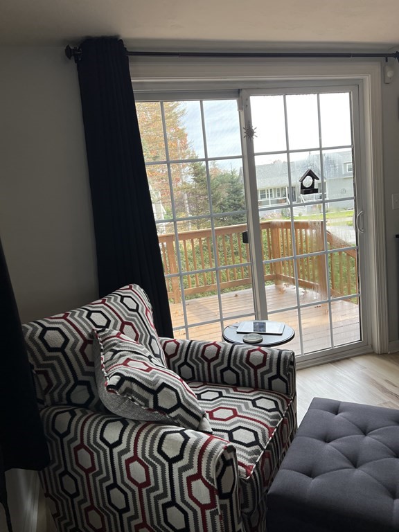 34 Colonial Road Webster, MA 01570 - Photo 17 of 35 a bed sitting in a bedroom next to a window